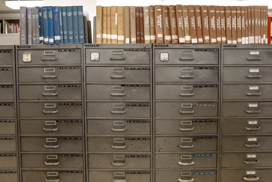 Organized filing cabinet with indexed folders — how long to keep a deceased person's documents