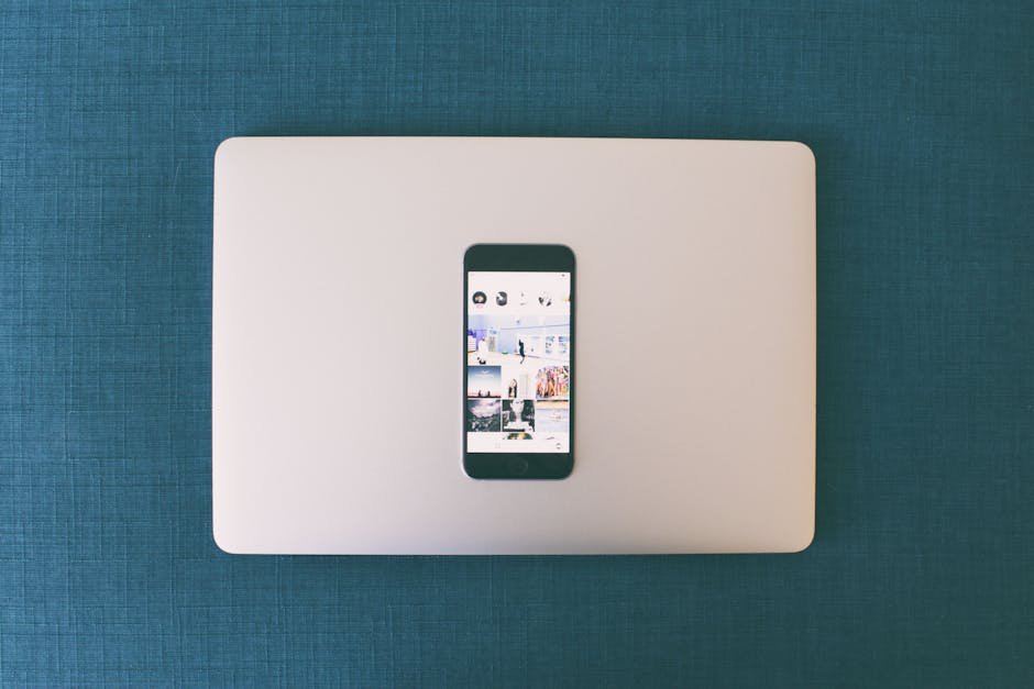 Smartphone on laptop showing social media — what happens to your digital accounts when you die